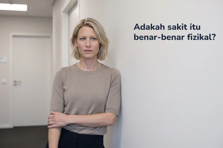 Adakah sakit itu benar-benar fizikal? — seorang wanita berhenti di koridor pejabat, lengan ditekan melintang perutnya