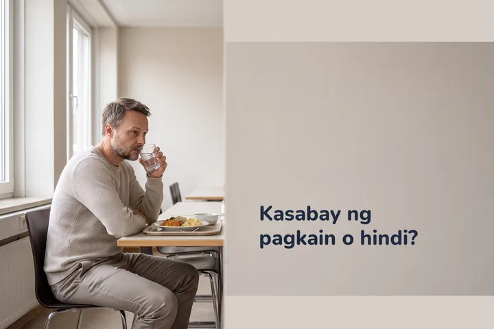 Kasabay ng pagkain o hindi? — isang lalaki sa tanghalian niya sa mesa ng kantina sa gitna ng araw